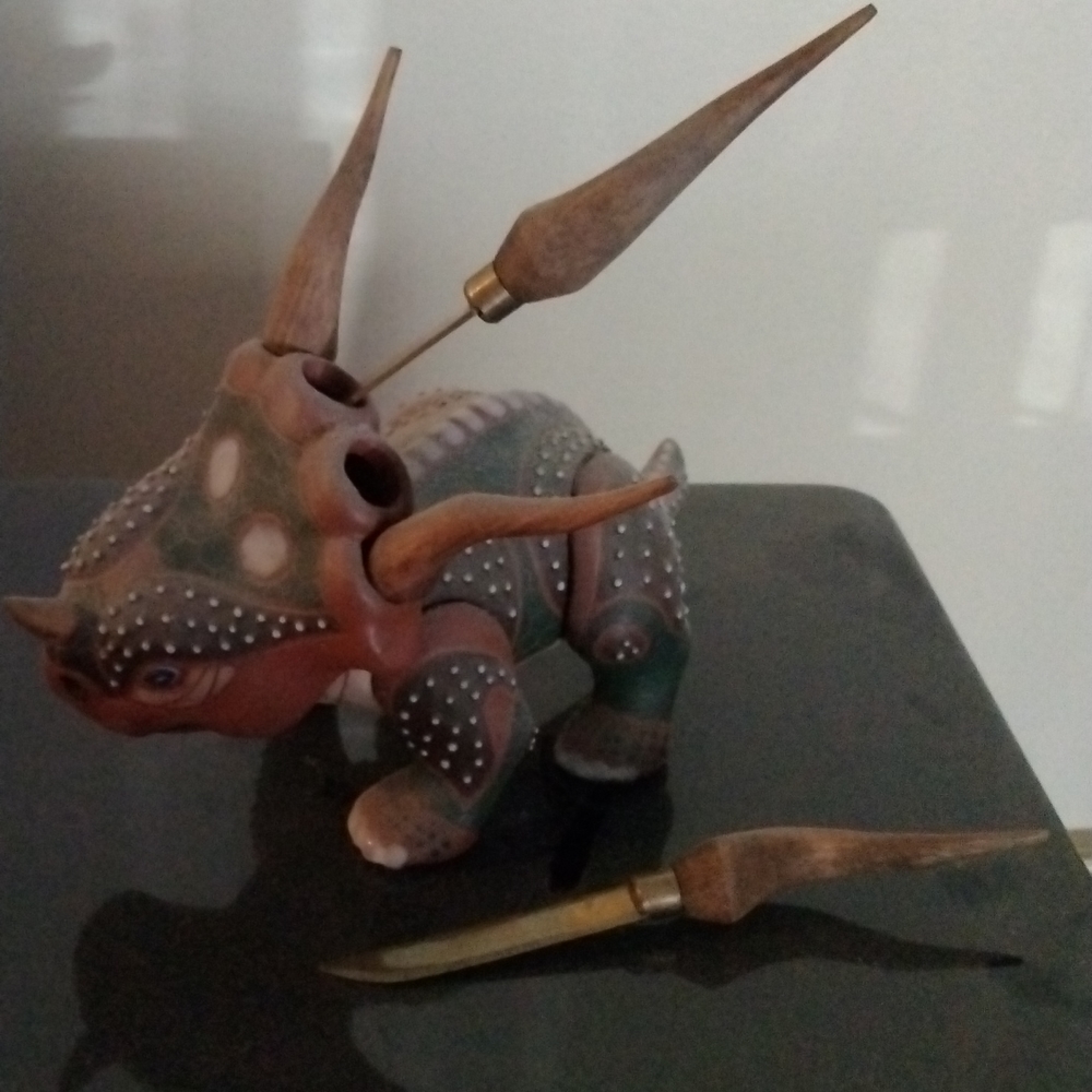 Dinosaur Ceramic Styracosaurs horns are hidden knives.How unique and fun